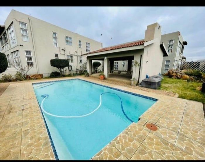 3-bedroom Townhouse for Sale in Oakdene with pool, garden, and inverter system.