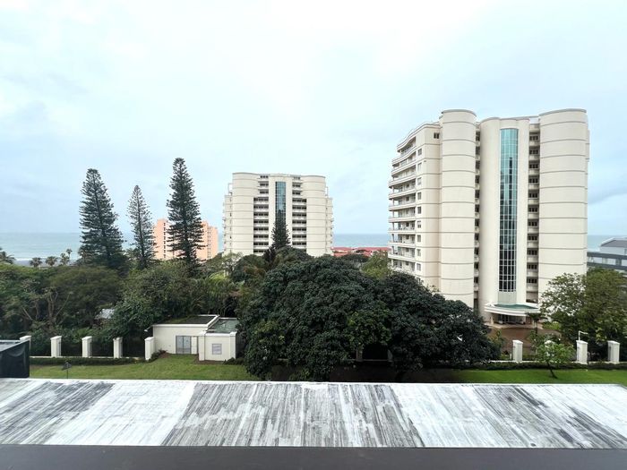 For Sale: Apartment in Umhlanga Central with sea views, parking, and security.