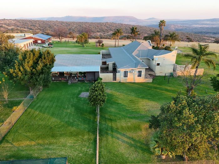 For Sale: Vryheid Central Farm with multiple homes, game infrastructure, and self-sustainability.