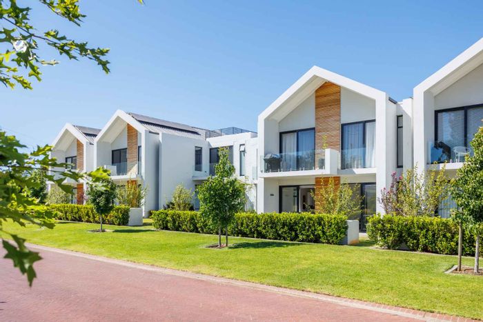 For Sale: Val De Vie Estate Apartment with 2 en-suites, private garden, and parking.