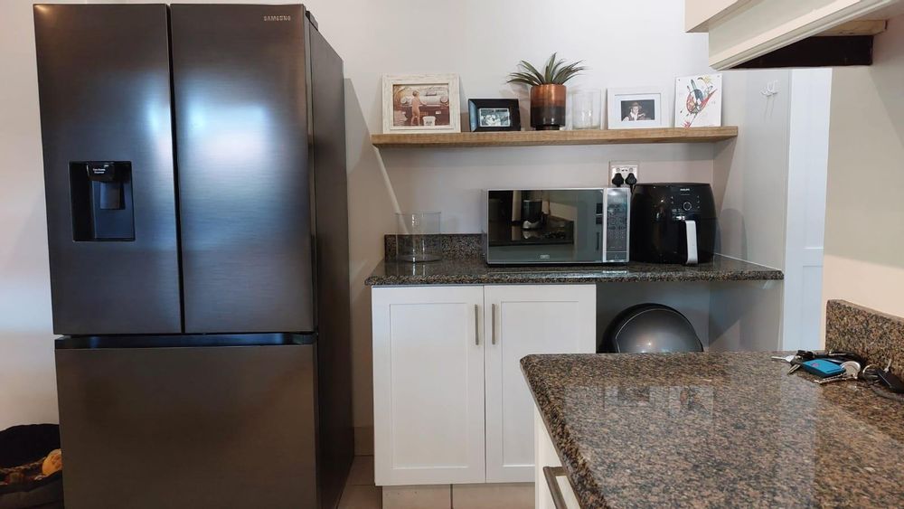 Kitchen with space for double door fridge/freezer