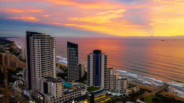For Sale: Ocean-view apartment in Umhlanga Rocks Central with pool and amenities.
