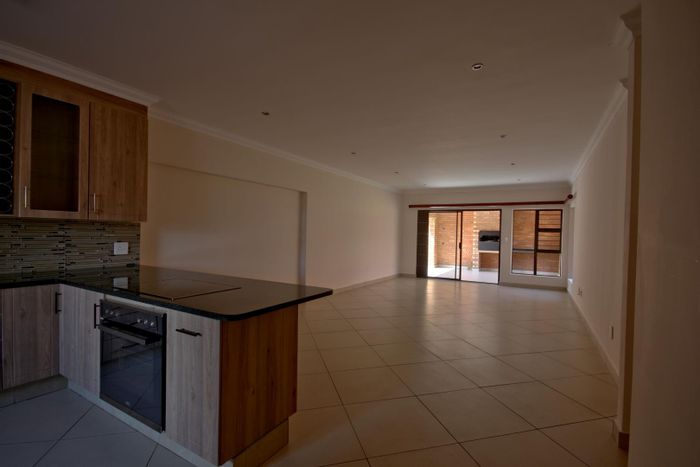 3-Bedroom Townhouse in Olympus To Rent with garage, patio, and security features.