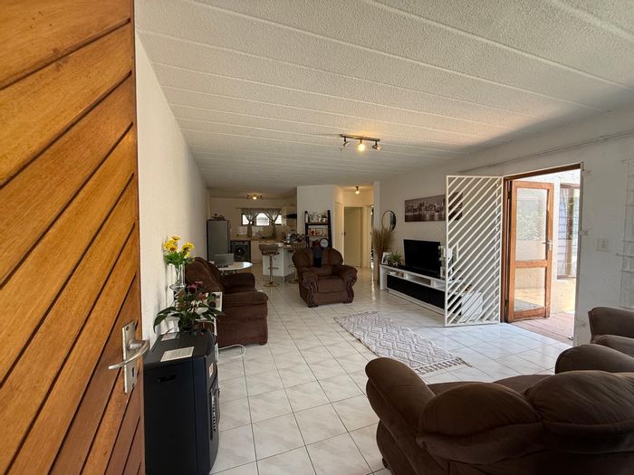 For Sale: 2-Bedroom Apartment in Sandown with Pool, Security, and Balcony.