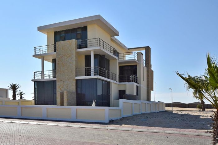 For Sale: House at Afrodite Beach with sea views, balconies, and spacious garage.