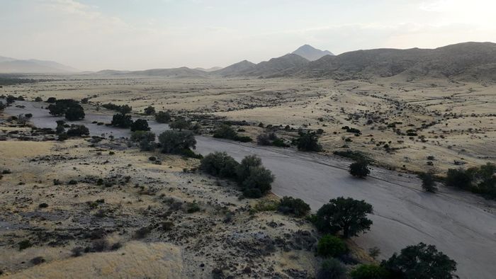 Farm for Sale in Usakos Central: 10,000 ha with residence, pool, and plots.