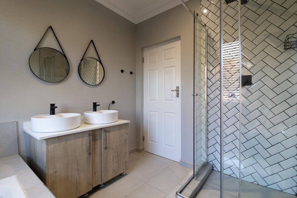 2nd Bathroom with double vanity, shower and bath