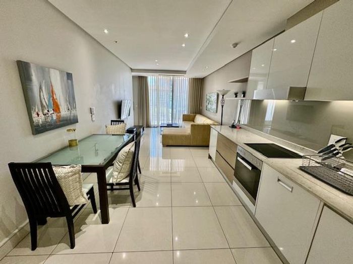 To Rent: Furnished 1 Bed Apartment in Sandown with balcony, pool, and concierge.