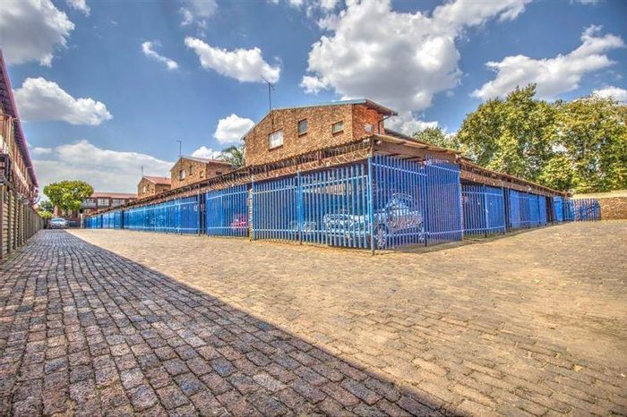For Sale: Apartment in Kempton Park Central with 2 bedrooms, security, and parking.