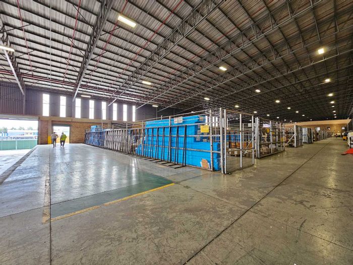 Industrial property for sale in Stormill: 14,600sqm with office space and loading docks.