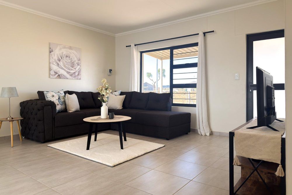 Modern, open-plan living area.