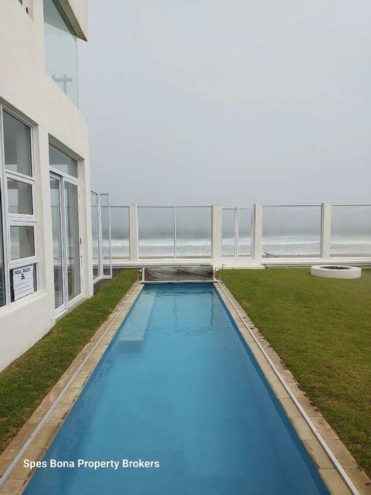 For Sale: Vogelstrand Beachfront House with Ocean Views, Pool, and Entertaining Spaces