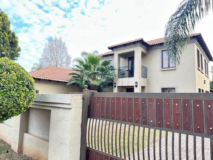 For Sale: Spacious 3-bed house in secure Montana complex with garden and double garage.