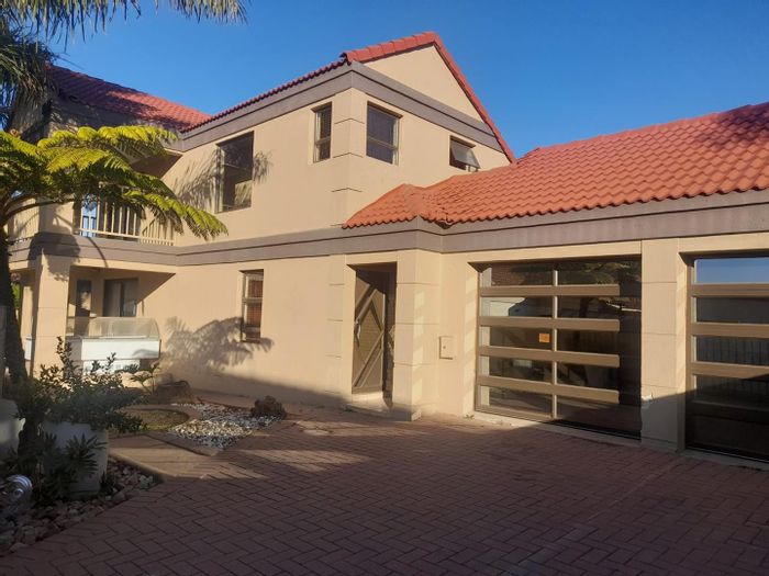 Glen Marais Cluster For Sale: Secure living with garden, braai area, and spacious garage.