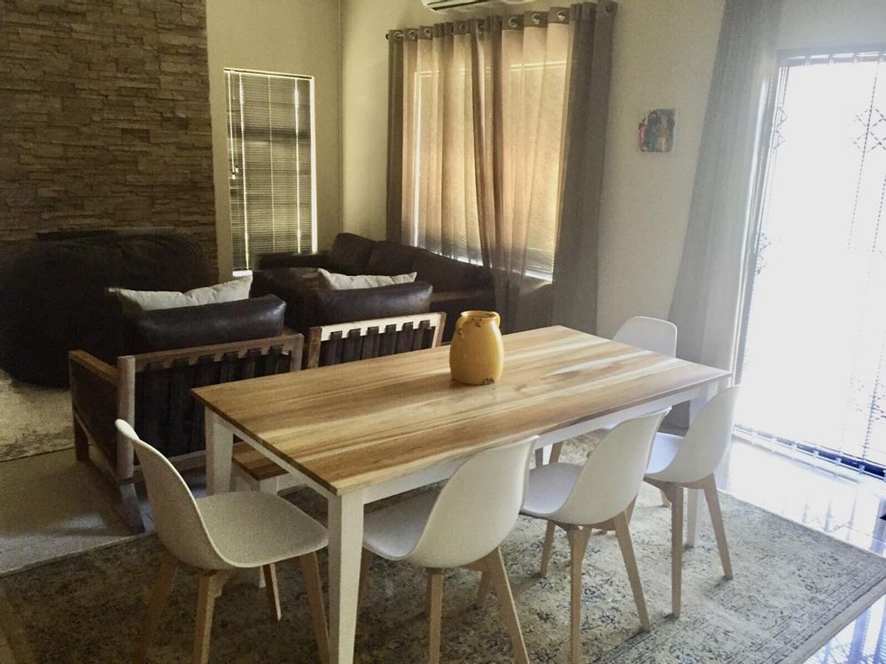 a view of the dining and living area from the kitchen