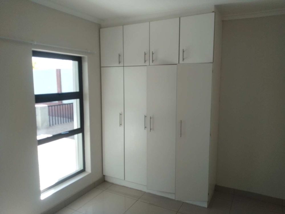 General view of the build-in cupboards found in the Main Bedroom. 