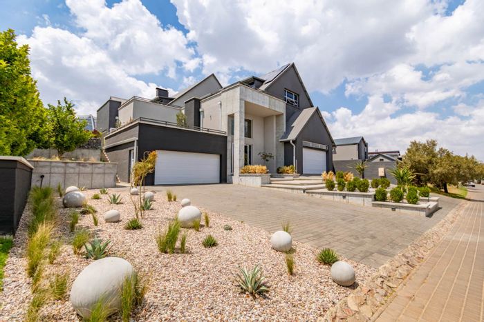 For Sale: House in Waterfall Country Estate with pool, garages, and solar power.