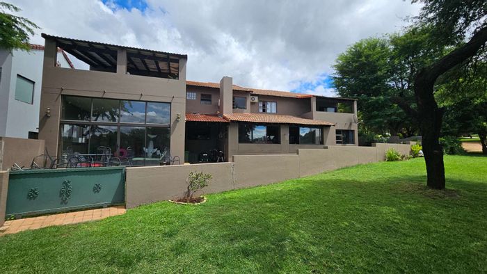 Apartment To Rent in Hartbeespoort Central: 2 beds, pool, garage, scenic views.