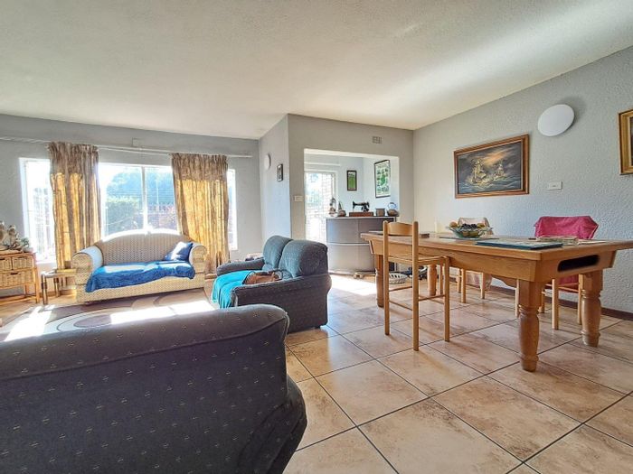 For Sale: Townhouse in Brackenhurst with private garden, garage, and communal jungle gym.