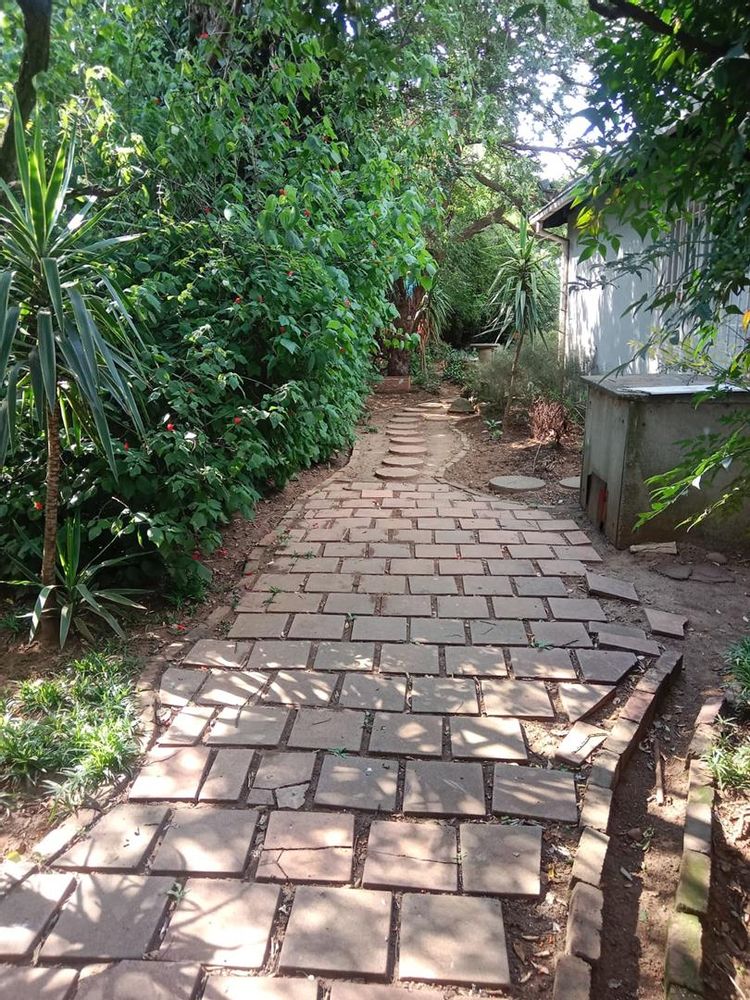 Walkway from the separate gate to the pool or entertainment area