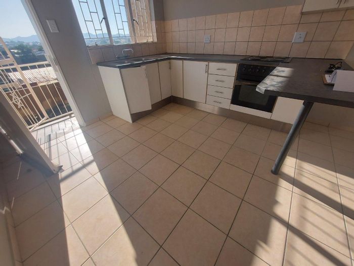 For Sale: 2-Bedroom Townhouse in Katutura with private garden and open parking.