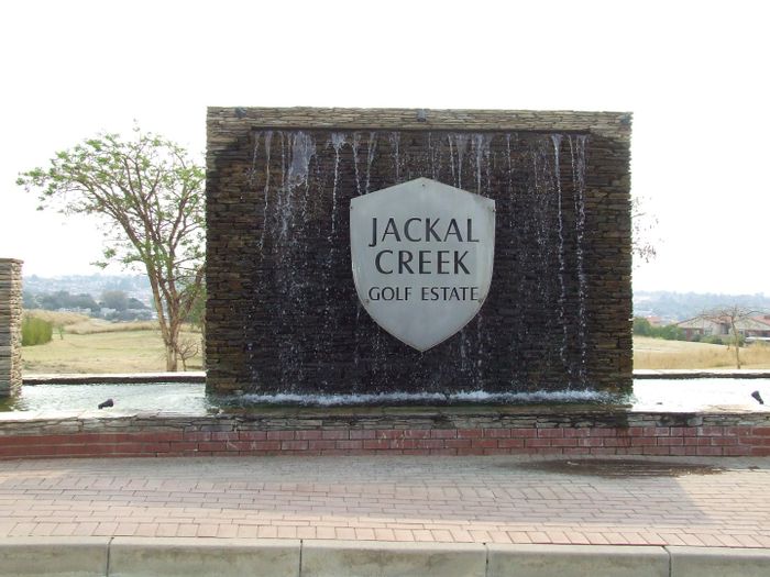 For Sale: 2-Bedroom Apartment in Jackal Creek Golf Estate with pool and security.
