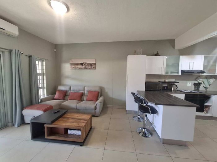 Klein Windhoek Apartment For Sale: 2 Bedrooms, outdoor space, air-conditioning, investment opportunity.