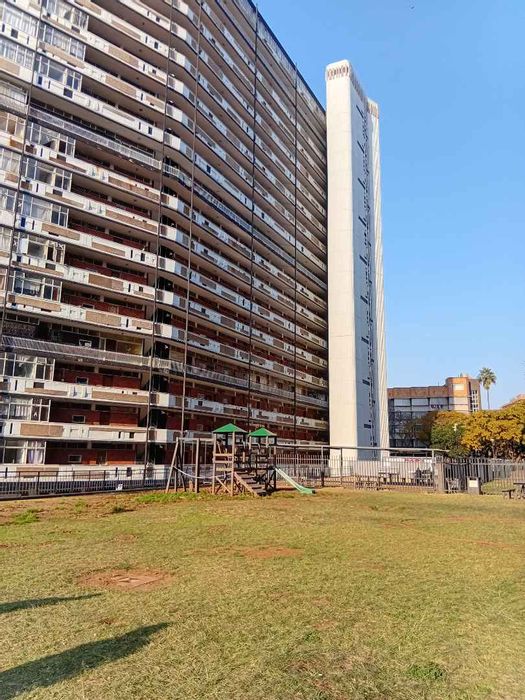 1-Bedroom Apartment For Sale in Sunnyside with Pool, Security, and Extra Room.