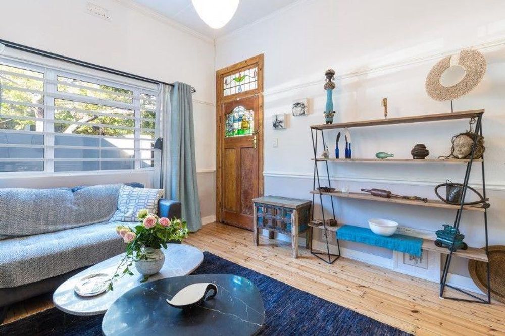 Living room - Glass stained main entrance door with beautiful wooden floors 