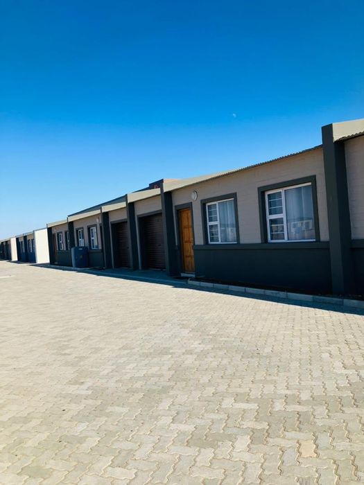 Townhouse for Sale in Walvis Bay Central: Secure living, energy-efficient, transfer fees included.