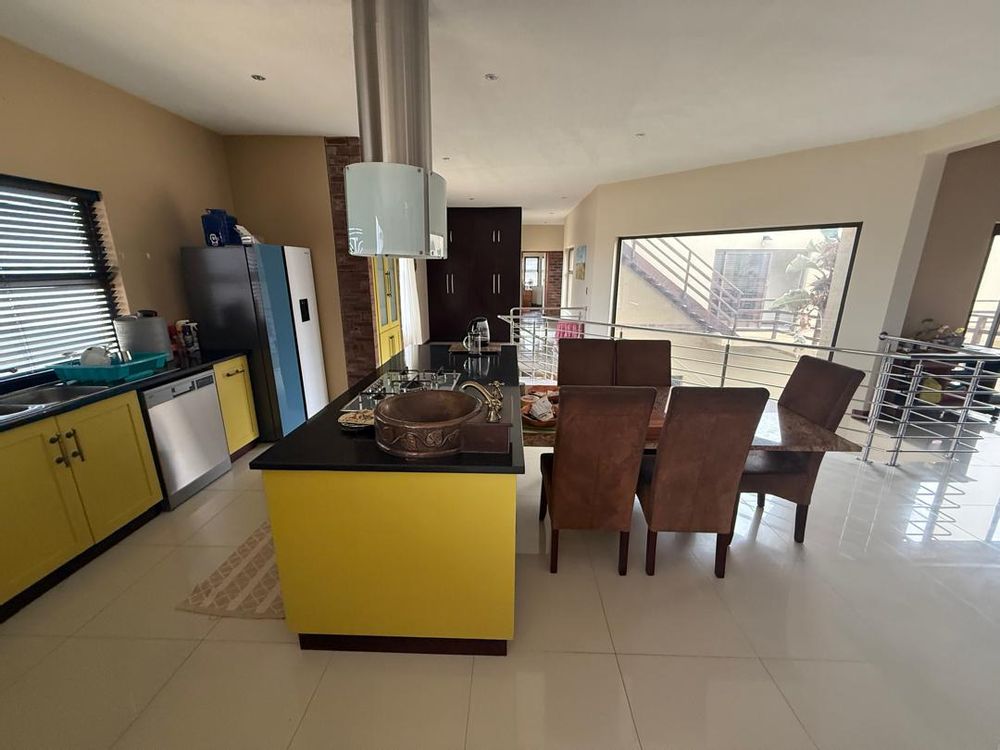 Kitchen with BIC, oven and stove. 