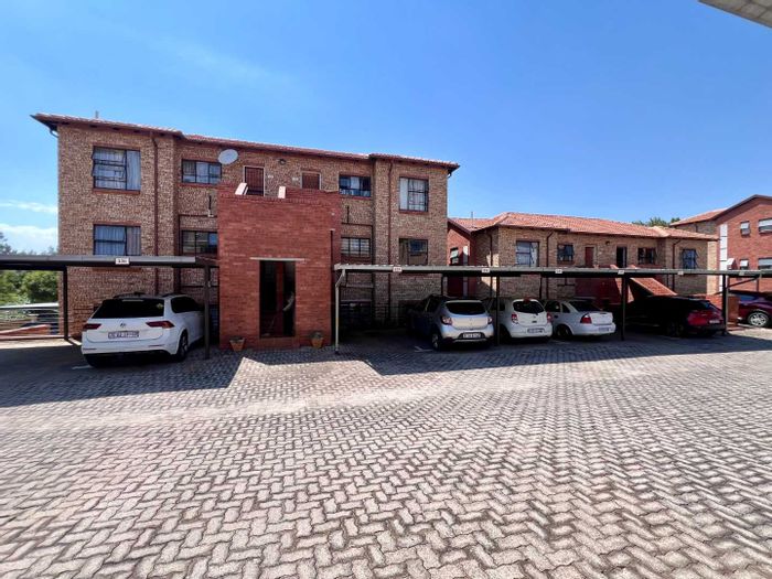 2-Bedroom Apartment To Rent in Weltevreden Park with pool, garden, and security.