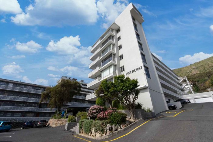 Sea Point Apartment For Sale: 2 beds, large balcony, garage, and storeroom.