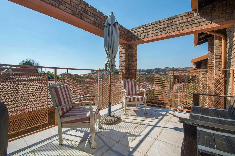 Upstairs patio with views over the Kloofendal Hills , can be roofed and enclosed with permission