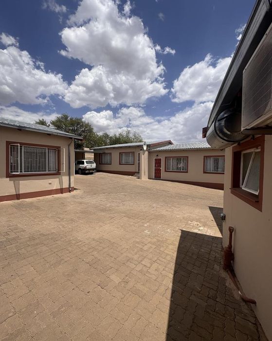 For Sale: House in Pioniers Park Ext 1 with five rental units and secure parking.