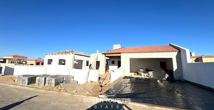 For Sale: House in Rossmund Golf Resort with 3 en-suites, rooftop BBQ, and garages.