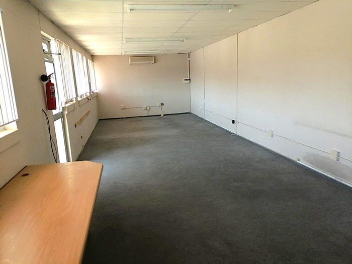 For Sale: Office in Windhoek Central with open plan layout, kitchen, shared toilets.