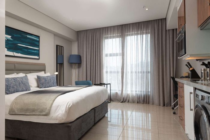 For Sale: Apartment in Umhlanga Rocks Central with sea views, pool, and hotel amenities.