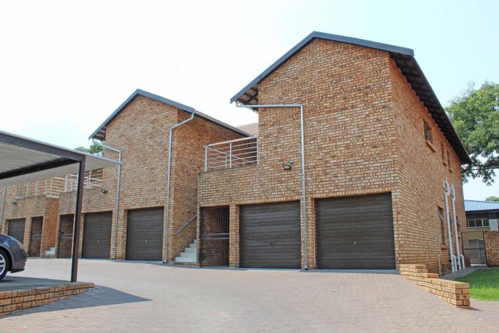 Spacious 3-bedroom townhouse in Brackenhurst with garage, patio, and fibre ready. To Rent.