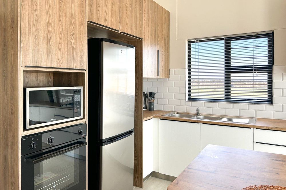 Modern kitchen with sleek kitchen island.