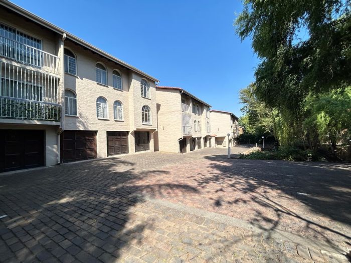 For Sale: South Crest Apartment with 2 beds, en-suite, garage, and gated access.