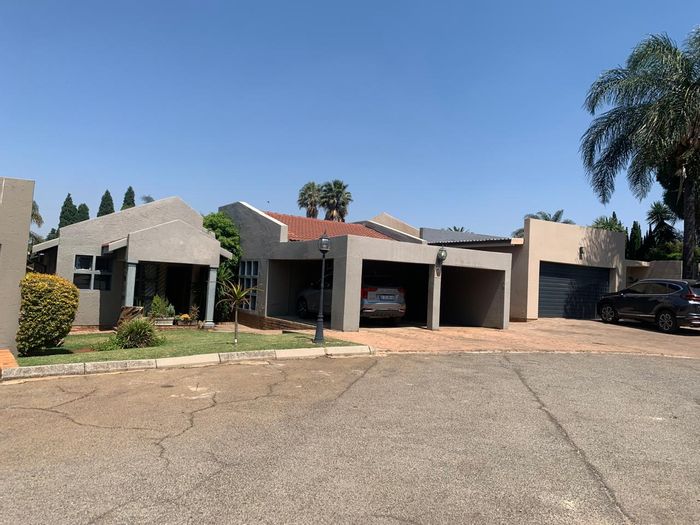 For Sale: Townhouse in Van Riebeeck Park with pool, 3 beds, 2 baths, double garage.