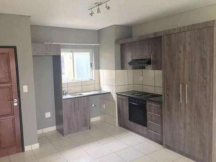 Townhouse for Sale in Windhoek North: 2 Bedrooms, Indoor Braai, Secure Parking.