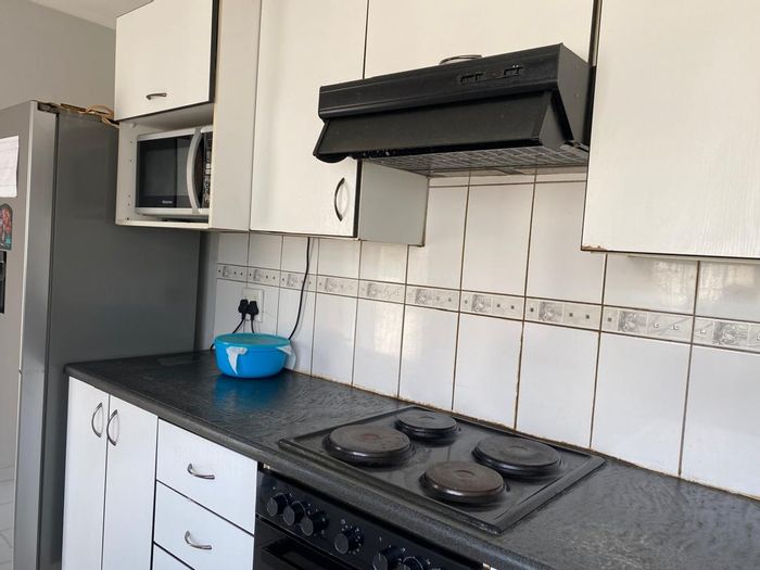 4-Bedroom House For Sale in Windhoek North with study, garages, and entertainment area.