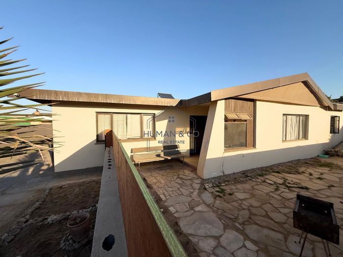 For Sale: House in Lagoon with 4 beds, 2 baths, and rental flat.