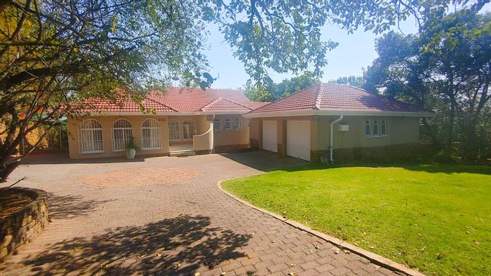 For Sale: House in Waterkloof Glen with pool, study, and double garages.