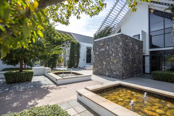 Office spaces for rent in Val De Vie Estate, near amenities and vineyards.