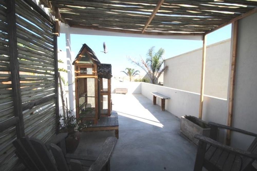 Private patio with boma, from the main bedroom