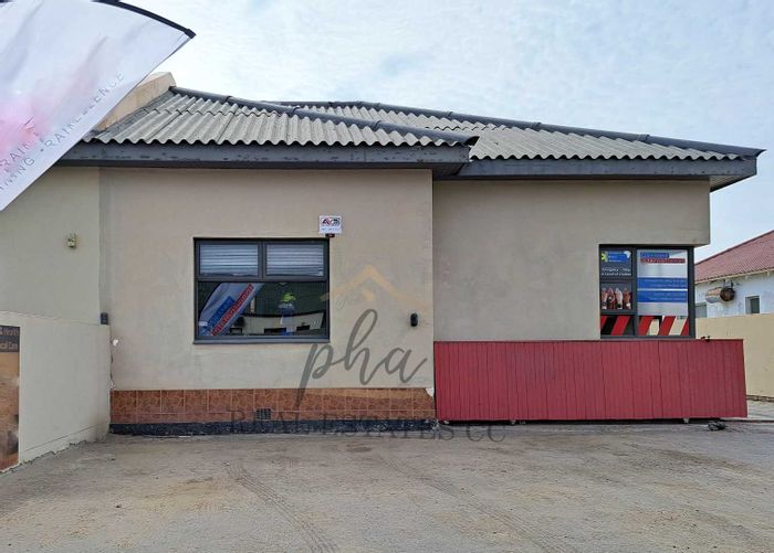 For Sale: Business in Walvis Bay Central with offices, boardroom, and flat.