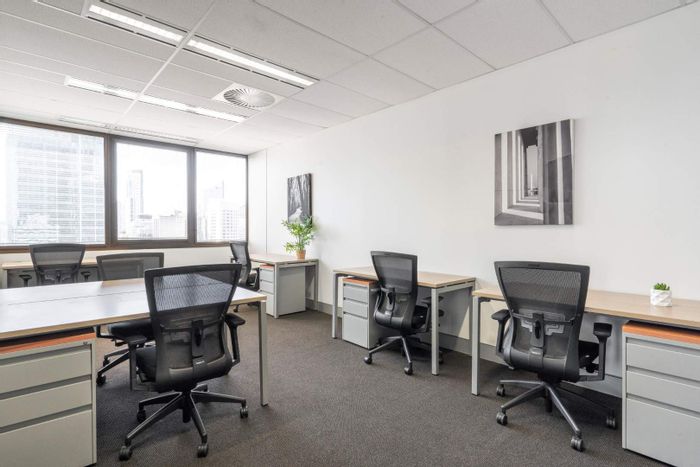 Braamfontein Office To Rent: 100 sqm, flexible terms, shared workspace, prime location.